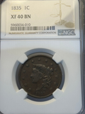 1835 US penny coin graded XF40 BN by NGC in a protective case.