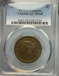 Gold coin in a clear holder with 'PCGS Genuine' label, held by a hand against a blurred background.