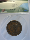 Coin in a protective case with grading information