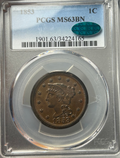 Coin in a protective case with a grading label held by a hand
